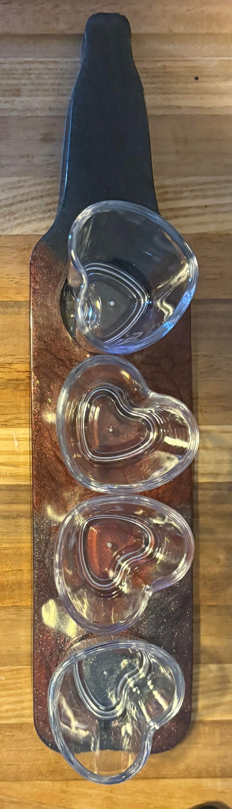 Epoxy Shot Glass Tray with Shot Glasses                                                                                       Handmade epoxy shot glass tray with shot glasses.  Black, Burgandy and Silver